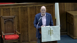 Ed at pulpit.png