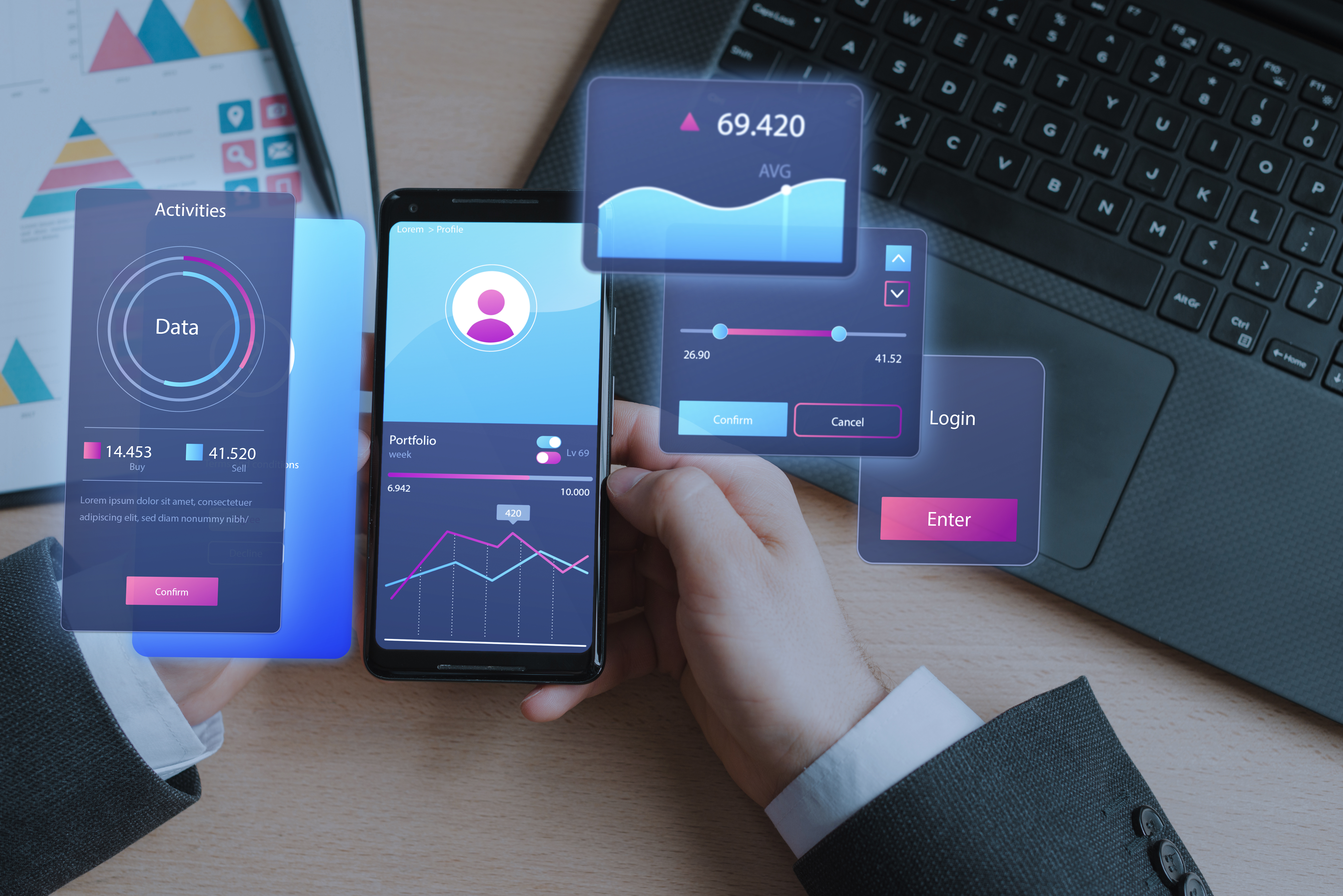 Person holding a smartphone with financial data charts. Holographic interface displays graphs and login options. Laptop on wooden desk.