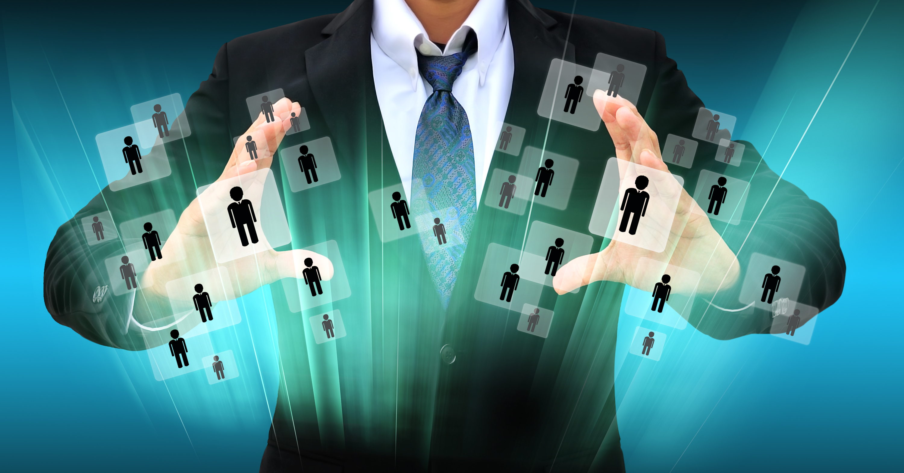 Businessman managing virtual icons of people, representing IT Staff Augmentation vs Outsourcing solutions for global workforce management.