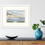 Thumbnail: Framed painting hanging on the wall above side board with a blue vase