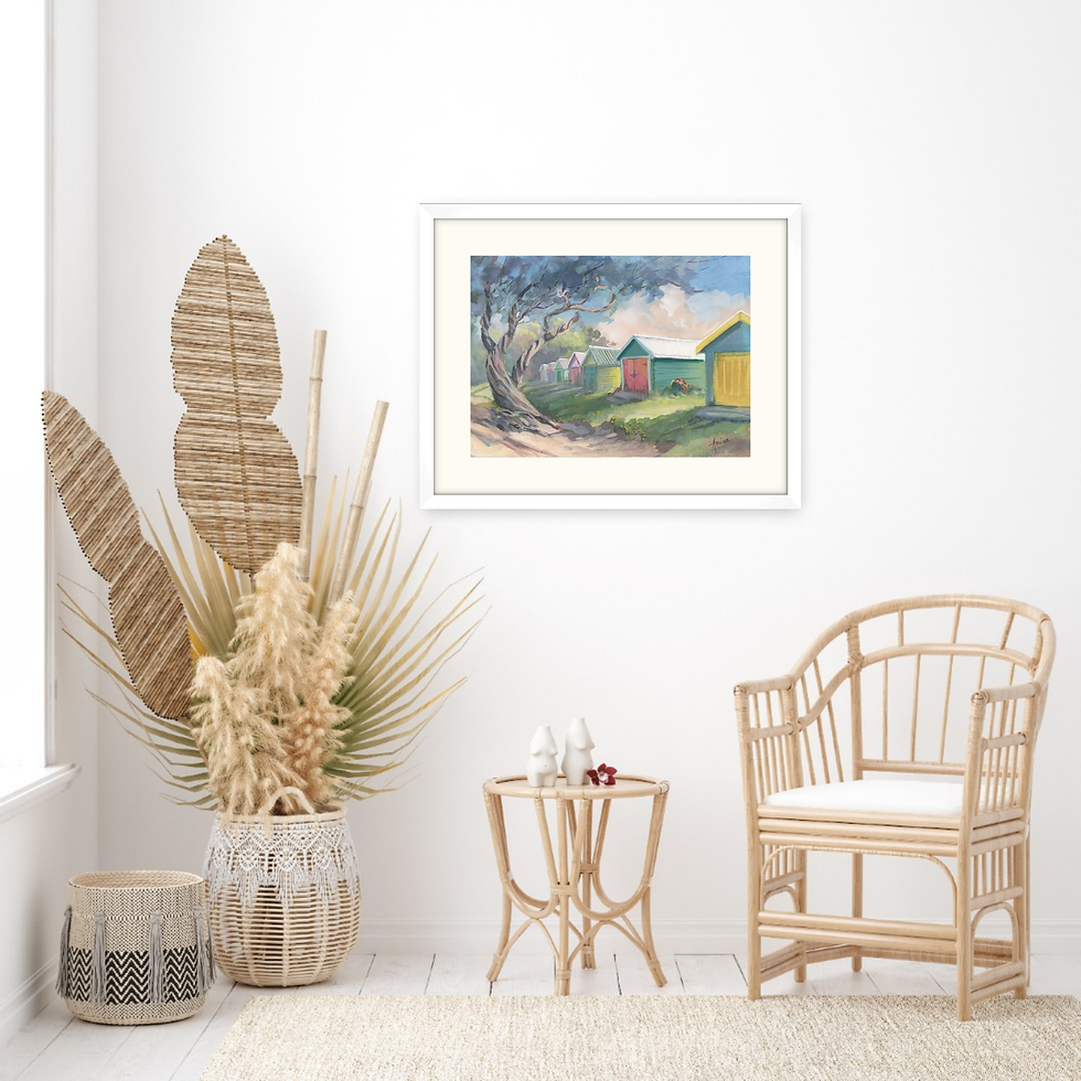 Thumbnail: Framed painting of colourful beach at Mornington above cane furniture.