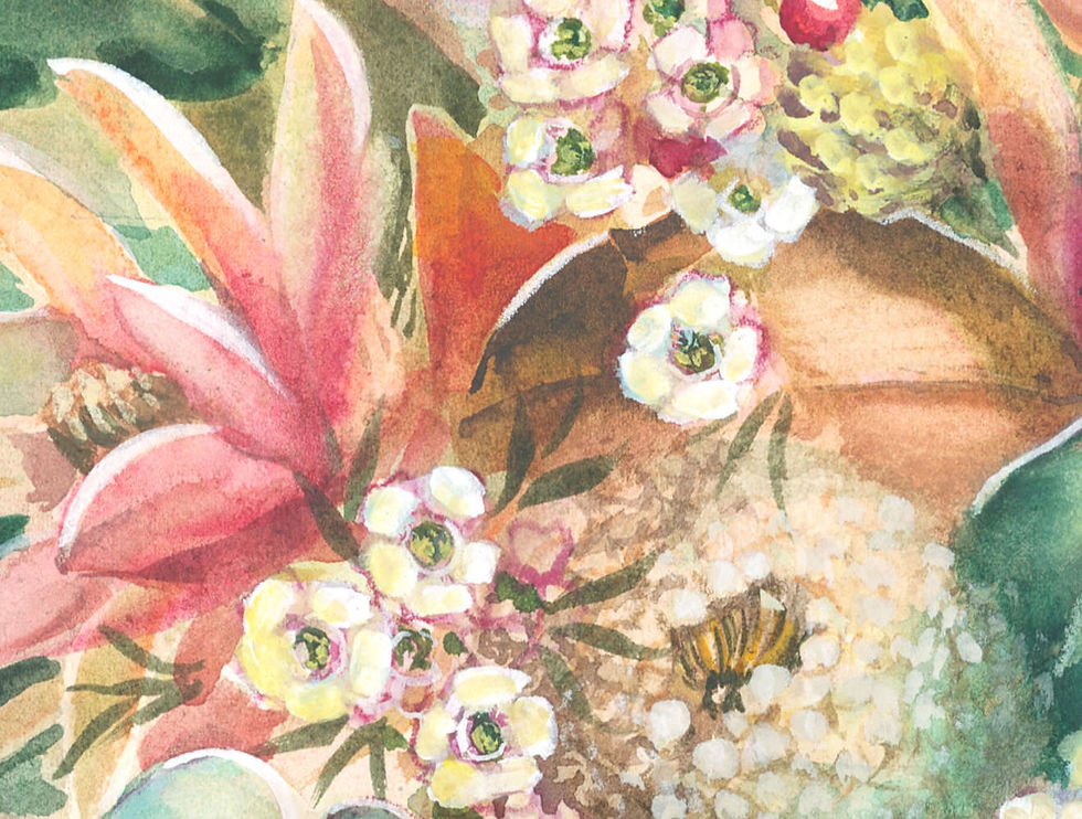 Bouquet of native flowers in peach, pink and yellow with greenery