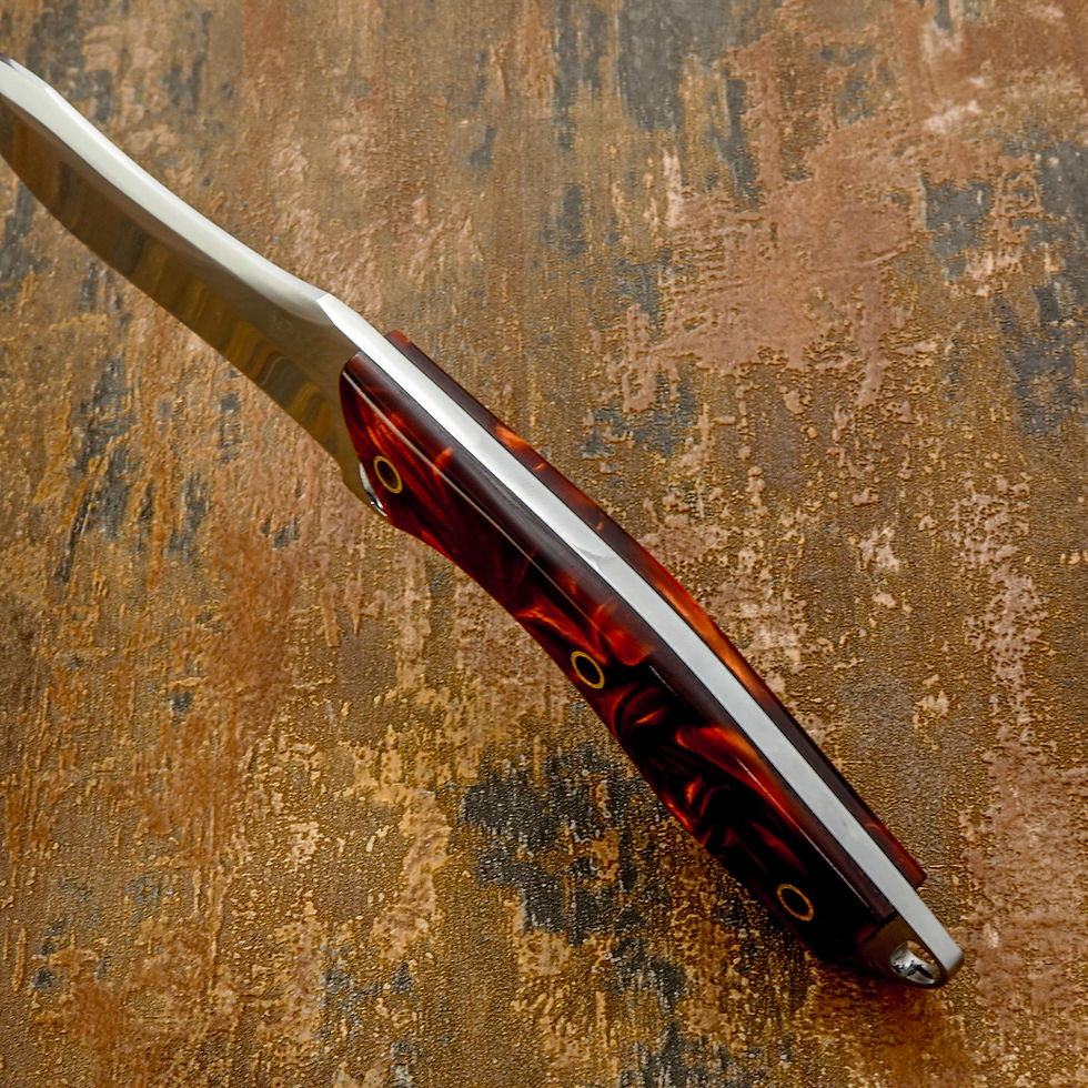 Full Tang practical blade profile with a striking fire-pattern resin handle,