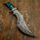 Thumbnail: commanding, hand-forged bowie built for presence, power, and artistry, Forward-Swept Bowie showcases deep flowing Damascus pa