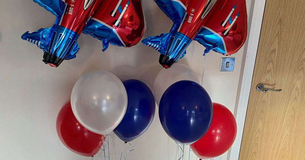 Planes red white and blue balloons