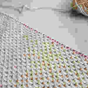 A close up of knitting on the needles