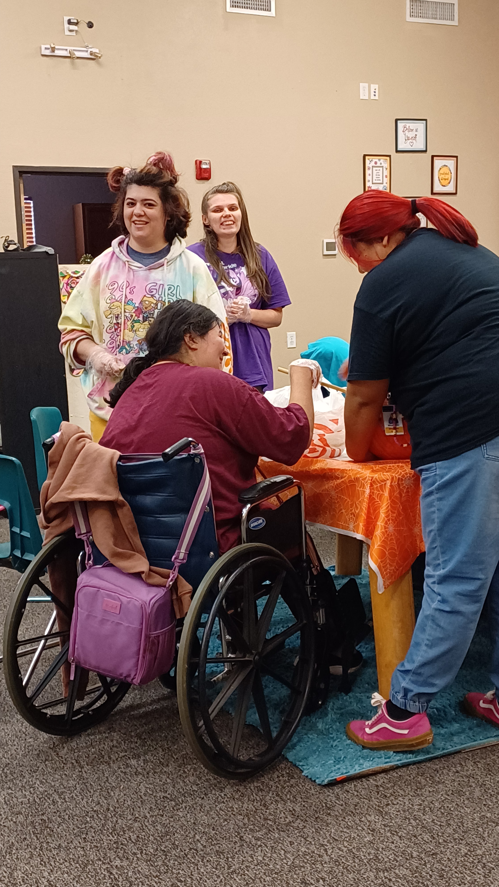 Lexington Services Show Low adult day program members creating their ‘Different, Not Less’ scarecrow for the City of Show Low Scarecrow Competition at Bluff Trail.