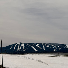sunrise park resort outing scenic road with snow and trees