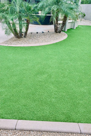 long custom putting green artificial turf fence line Phoenix AZ Fireside Pools