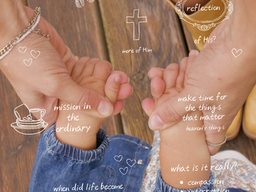 Mom and Daughter Holding Hands While Facing One Another
