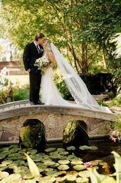 A charming event venue with waterfall and over water bridge and a beautiful garden setting in Oakley, CA.