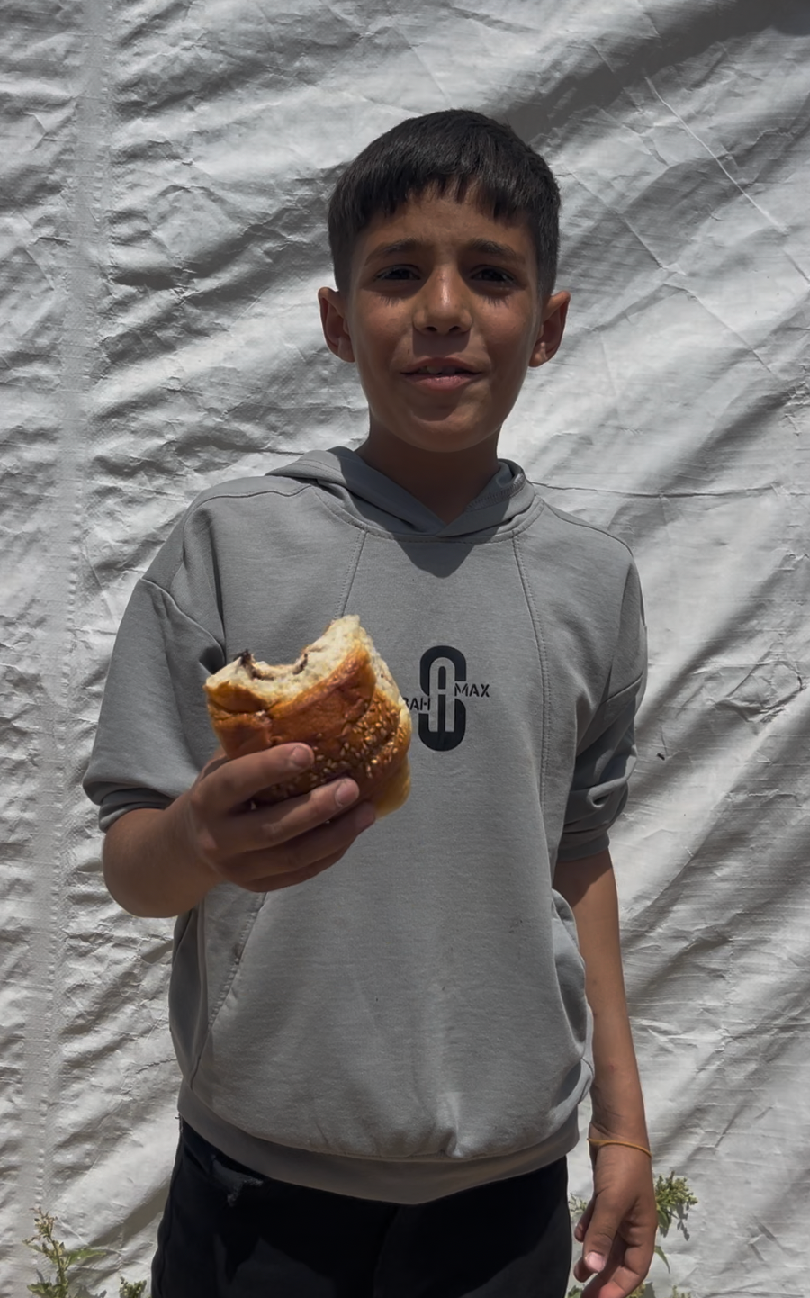Children Smile as Emergency Food Arrives for Hungry Families in Gaza