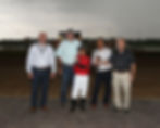 Bruce Murphy & Genaro Garcia in the winner's circle after Holy Justice's Miss Indiana Stakes win