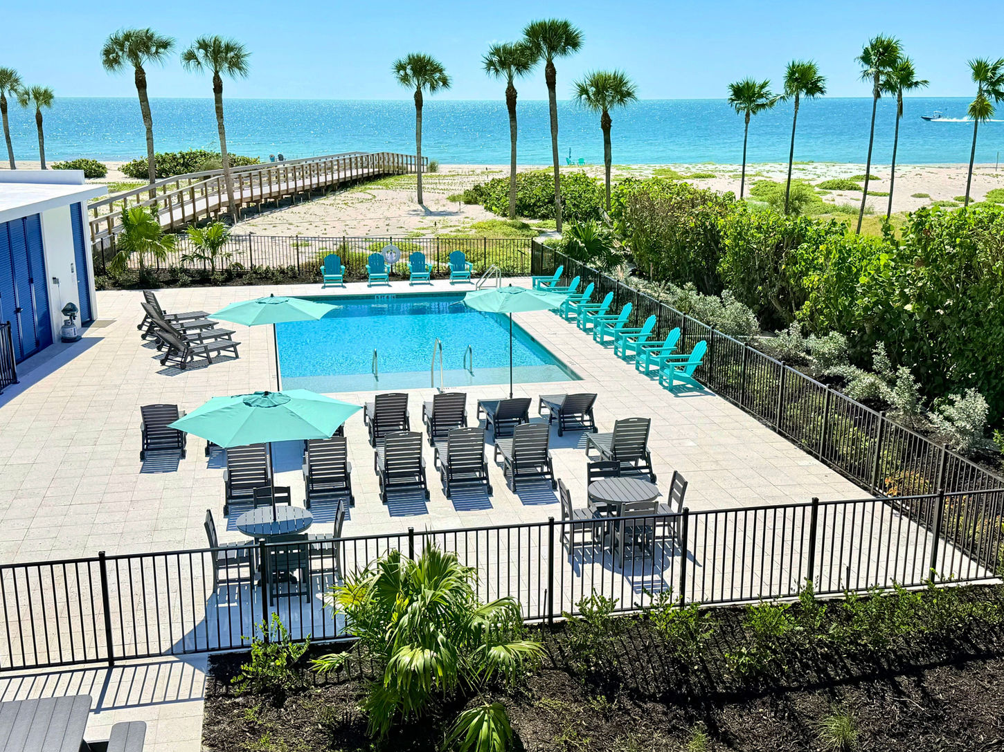 One Bedroom Villa pool and beach view from patio