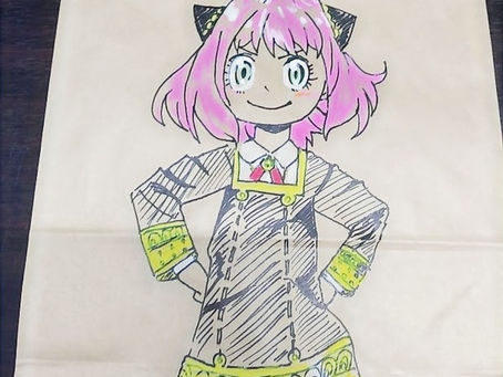 駄菓子屋から極上のサービスを!メンバー特製イラスト付き紙袋!