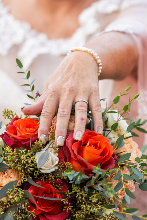 Bridal bouquet featuring a stunning arrangement of fresh, elegant blooms, crafted by Blossom & Bloom Floristry to perfectly complement the bride’s special day.