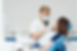 close-up-portrait-beautiful-young-lady-sitting-dental-chair-while-stomatologist-hands-ster