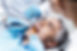 male-is-lying-dental-chair-being-given-root-canal-by-dentist-assistant.jpg