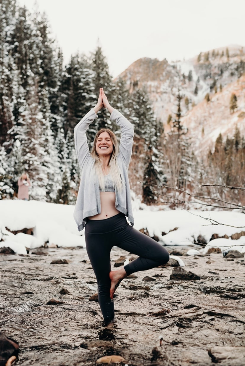 Practicing yoga outside while also taking in the healing powers of water and nature.