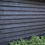 Thumbnail: Black feather edge barn lap board as fence