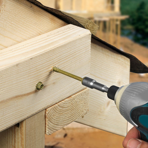 Thumbnail: timber frame construction screws being screwed in wood