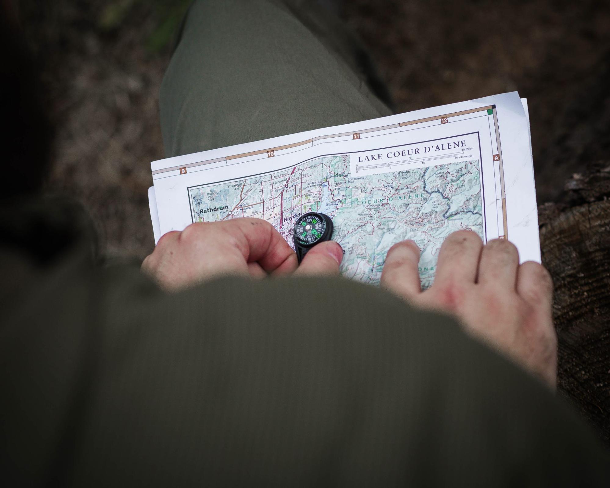 Making a plan, reading a map with a compass