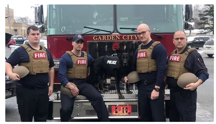 Firefighters wearing body armor