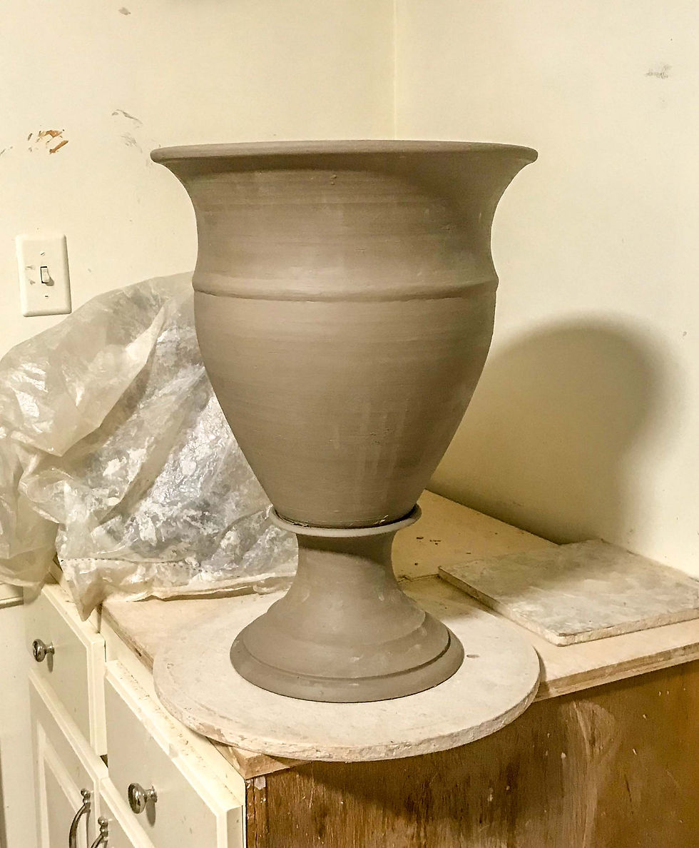 This garden urn is made of three parts, each created on the wheel