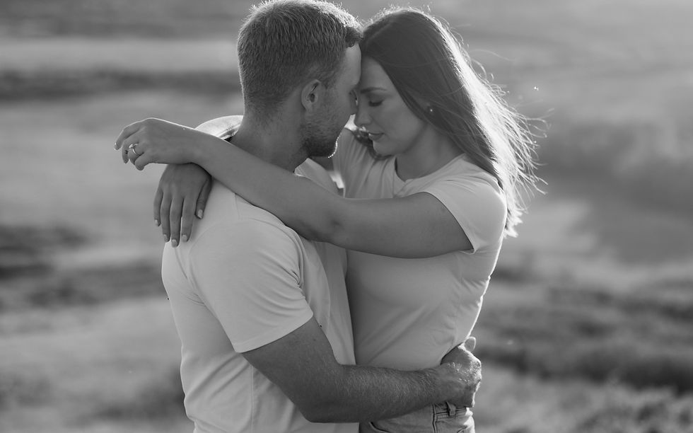 Get inspired by this golden-hour countryside engagement session with vintage flair, personalized props, and romantic aesthetics. Captured by Lloydminster photographer Sarah Thorpe.