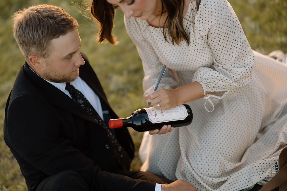 Get inspired by this golden-hour countryside engagement session with vintage flair, personalized props, and romantic aesthetics. Captured by Lloydminster photographer Sarah Thorpe.