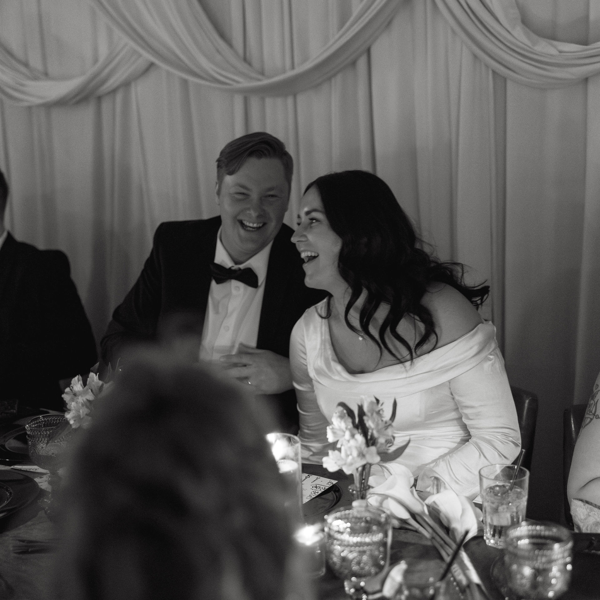 Lloydminster Bride and groom enjoying their wedding reception surrounded by romantic candlelit décor