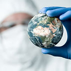 2 - Doctor Holding Globe - Square.jpg