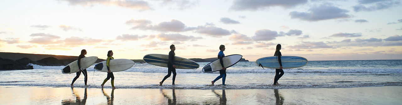 Porthmeor surfing beach with body & paddle boards at Porthminster