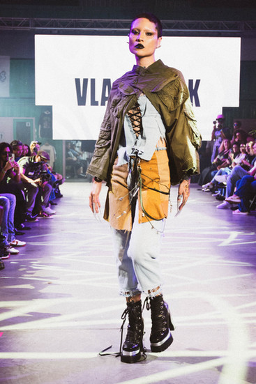 MIAMI, FLORIDA - DECEMBER 26: Models walking the runway wearing VLACKBOOK during Highest on the Runw