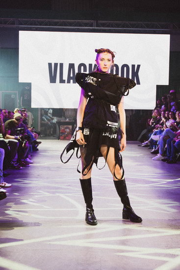 MIAMI, FLORIDA - DECEMBER 26: Models walking the runway wearing VLACKBOOK during Highest on the Runw