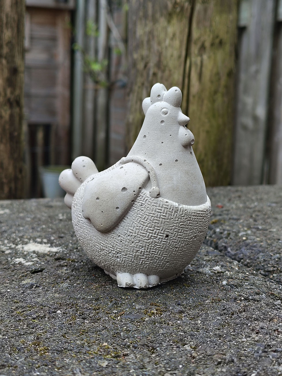 Kipje van cement voor in de tuin