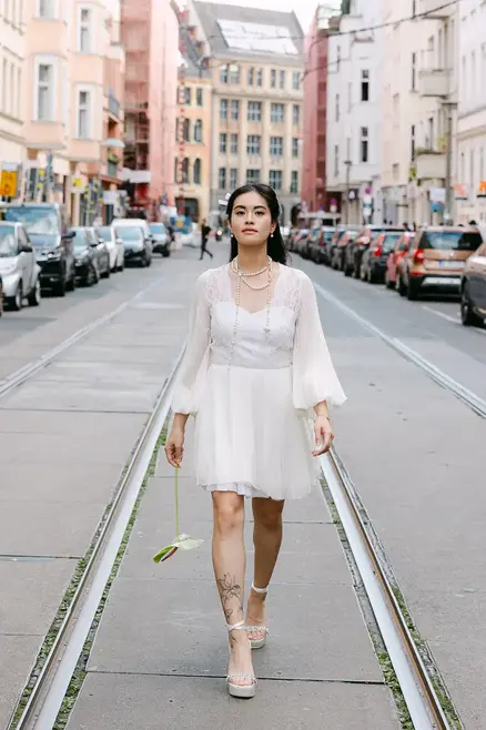 portrait of bride in wedding dress at Alte Schönhauser Street in Berlin