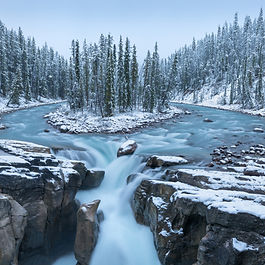 First snow Morning in Jasper National Park Alberta Canada Snow-covered winter landscape in the Sunwapta Falls on Athabasca River.
