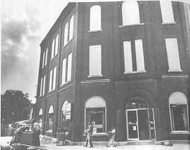 1972: Phillip Brown and son, moving
a bank safe down Broadway