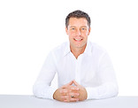 Man Sitting at Table