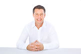Man Sitting at Table