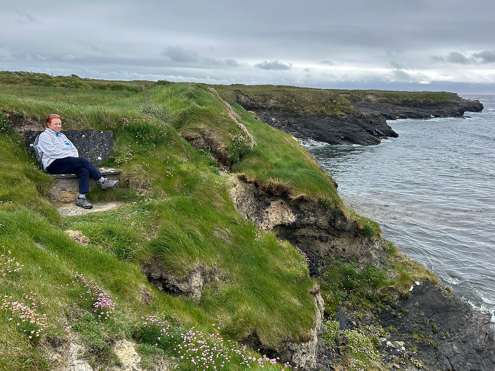 Lady Kathleen enjoying a perusal of the sea from a stone bench fashioned into the hillside. A lovely sight whichever way you're facing. This along the aforementioned Spanish Point walk.