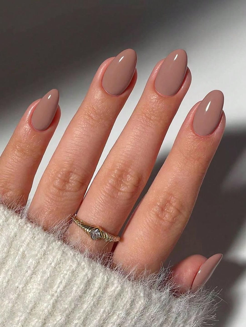 Mocha rose fall nails with soft pink and tan tones in a glossy finish, one of the top September nail ideas for 2025
