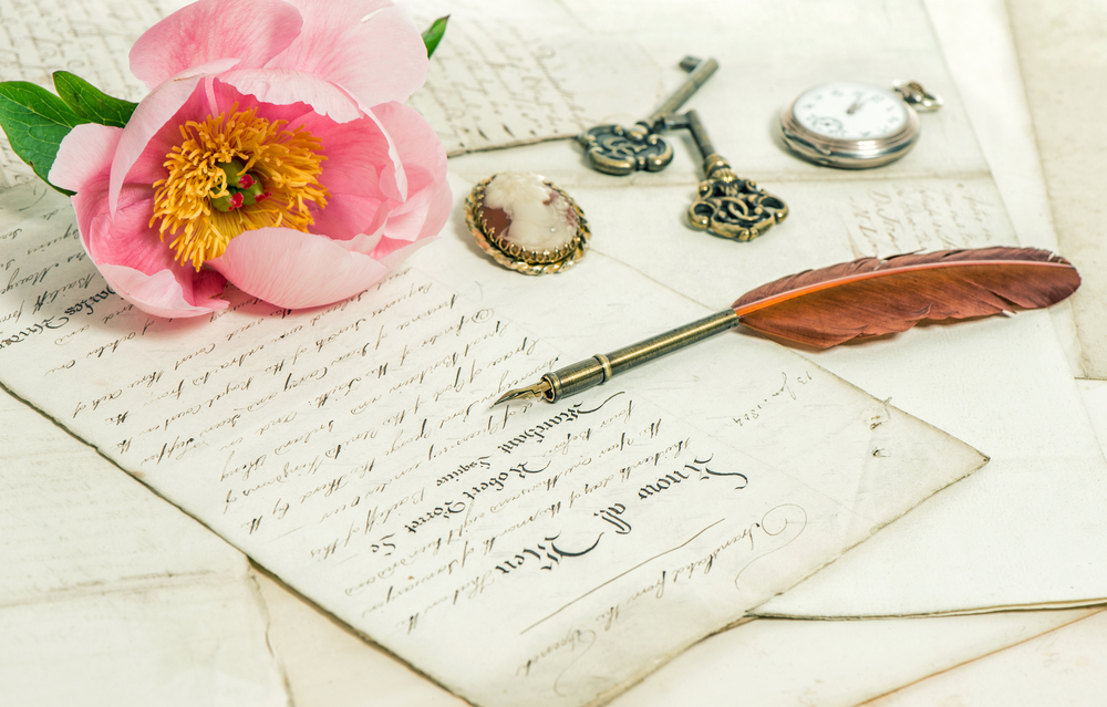 Notepaper with pink flower with written home carer testimonials