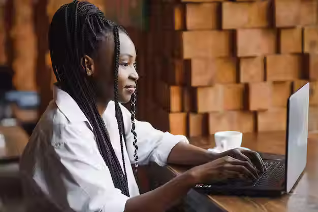 Black woman on laptop