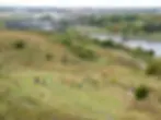 TVWT volunteers managing a meadow at Maze Park overlooking Stockton and the Infinity Bridg