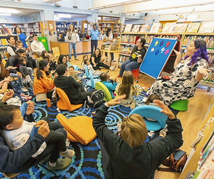 Parents and children at library storytime