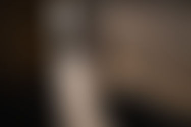 couple elopes at golden hour in nashville's parthenon in cinematic light