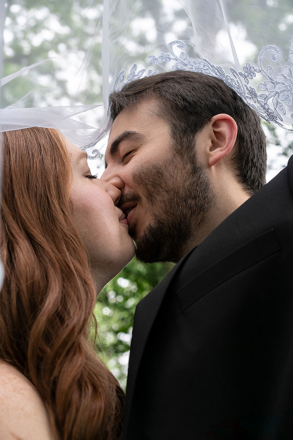 franklin elopement couple kissing under the veil