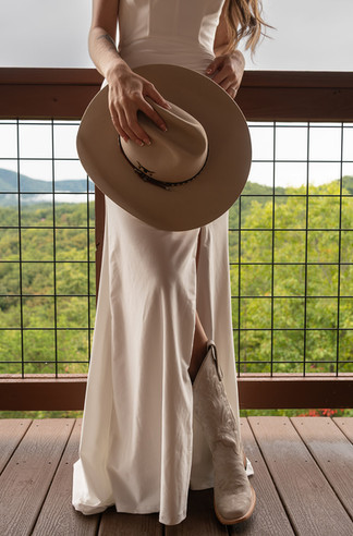 tennessee mountain elopement bride details cowboy boots and cowboy hat